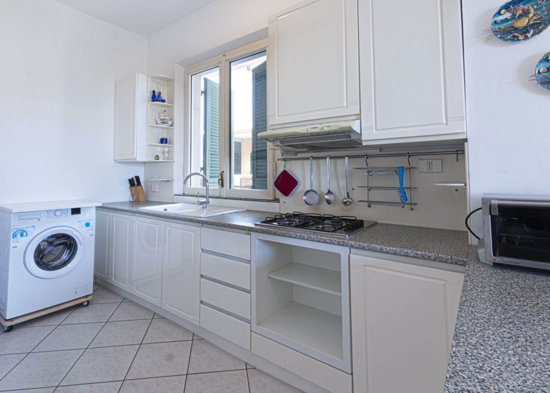 appartamento-chiara-cucina-con-lavatrice-